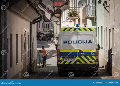 Slovenian Police Van Standing In A Pedestrian Way While Patrolling