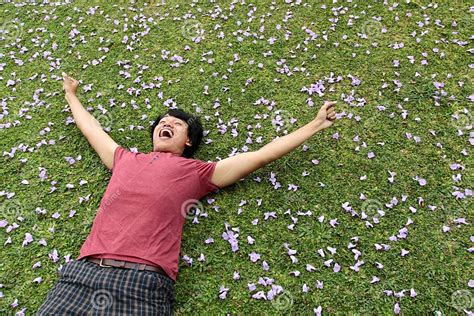 Man Lying On The Grass Stock Photo Image Of Person Modern 25896624