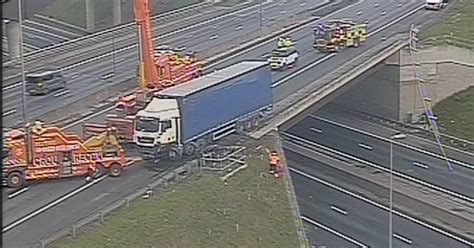 M And A Closed With Crashed Lorry Hanging Off Bridge