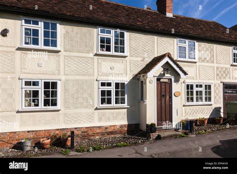 A Village House With A Chequerboard Pattern Of Pargetting Designs