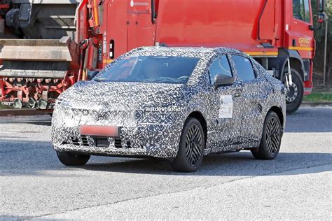 2026 Nissan Leaf Spy Pics Reveal Chill Out Concept Styling Cues With