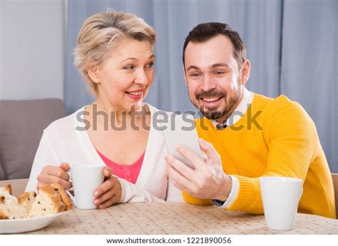 Smiling Son His Mature Mother Doing Stock Photo 1221890056 Shutterstock