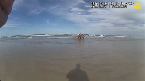 Volusia Sheriff Shares Body Cam Video Of First Responders Rescuing Lifeless Man From Surf R