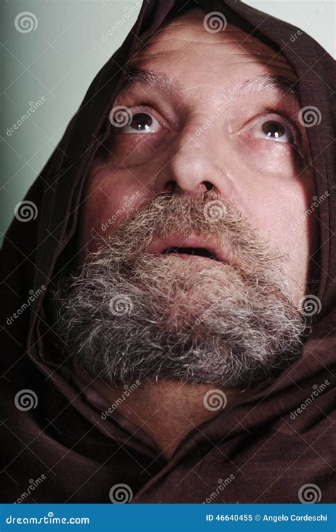 Capuchin Monk With A Beard Illuminated By Faith Praying God Stock Image