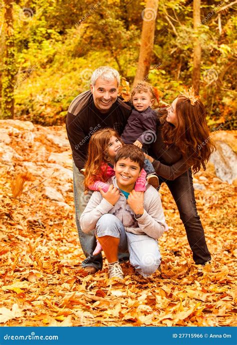 Happy family outdoors stock photo. Image of male, leaves - 27715966