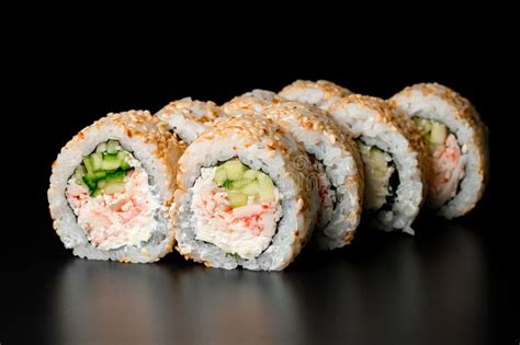 Tasty Sushi Rolls California With Snow Crab Meat Garnished Sesame Seeds