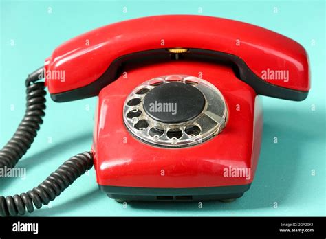 Retro Red Telephone On Table On Green Background Stock Photo Alamy