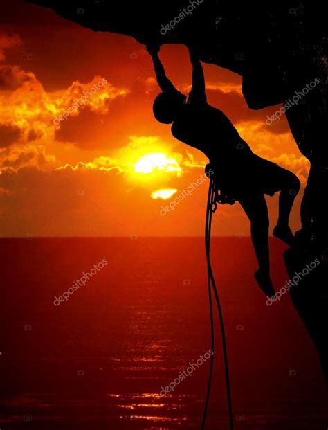 Rock Climbing During Sunset Stock Photo By ©razihusin 10093563