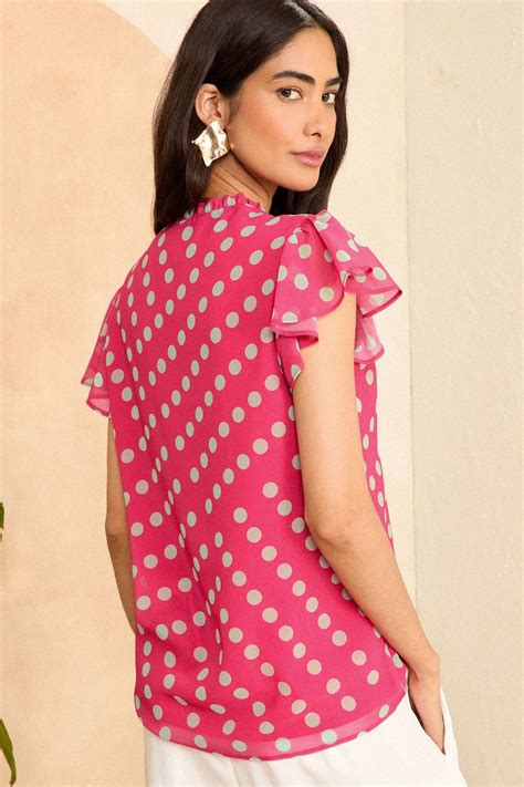 Buy Love And Roses Pink Polka Dot V Neck Flutter Sleeve Blouse From Next