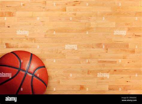 Basketball And Hardwood Maple Basketball Court Floor Viewed From Above