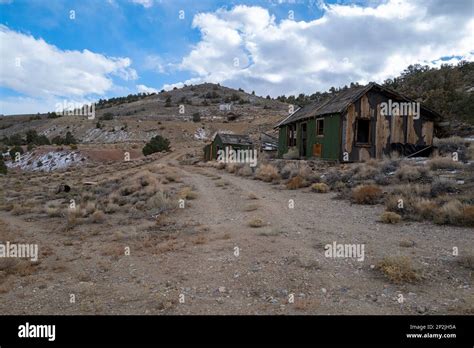 Shacks In Ruins Along A Dirt Road At An Abandoned Mine Nevada USA