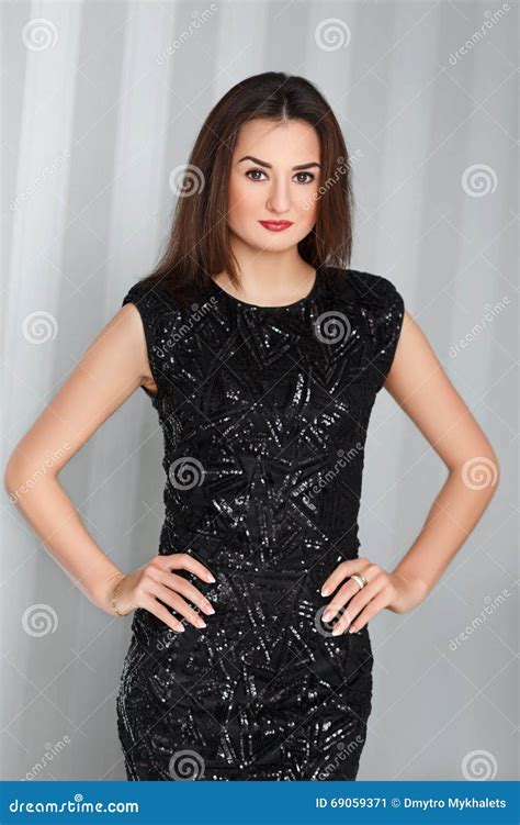 Young Beautiful Stylish Girl With Red Lips Posing In Amazing Elegant