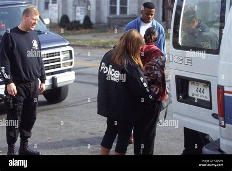 Female Suspect Is Arrested By A Female Police Officer Kansas City