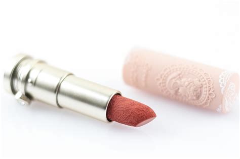 Premium Photo Nude Lipstick With Beautiful Embossed On White Background