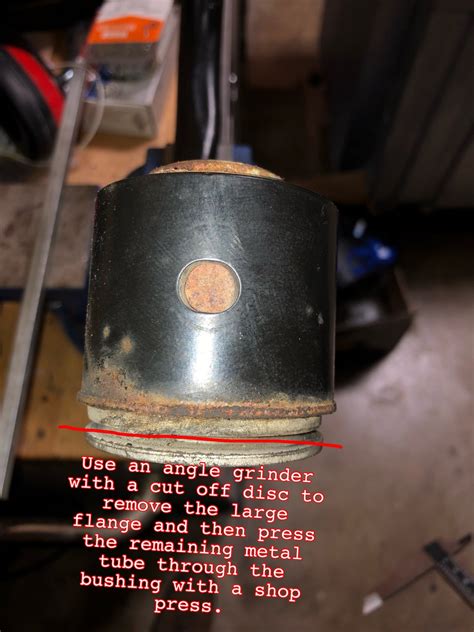 With Control Arm Removed Remove Bushings With Grinder Vice And Press