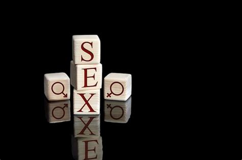 Premium Photo Word Sex Written By Wooden Cubes With Letters On Black Reflective Background