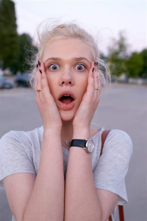 Close Up Image Of A Blonde Girl With A Stunned Face Grimacing Stock Image Image Of