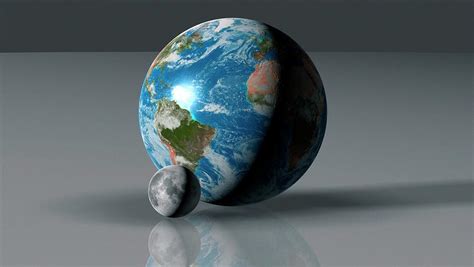 Earth Compared To Moon Photograph by Mark Garlick/science Photo Library ...