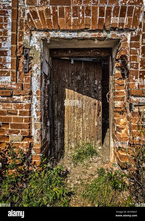 Entrance To An Old Abandoned Red Brick Building Stock Photo Alamy