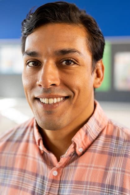 Premium Photo Portrait Of Happy Biracial Male Teacher With Tablet In