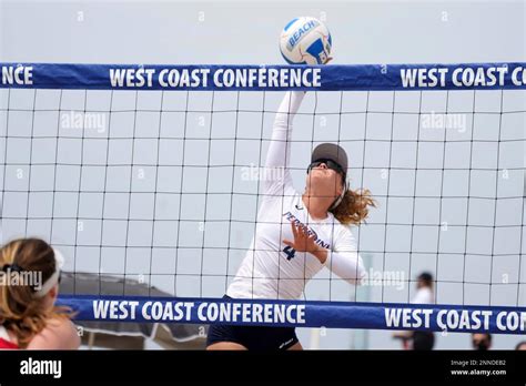 Mary Sinclair Of Pepperdine 4 Hits The Ball Against Loyola Marymount