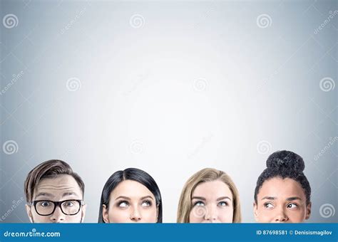 Close Up Of Business Team Faces Gray Stock Image Image Of Confident