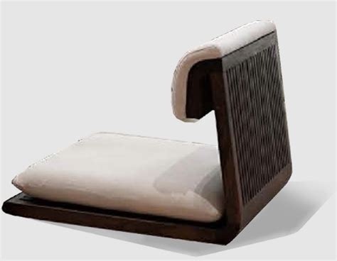 A Wooden Chair With A White Cushion On The Back And Seat Pad In Front Of It