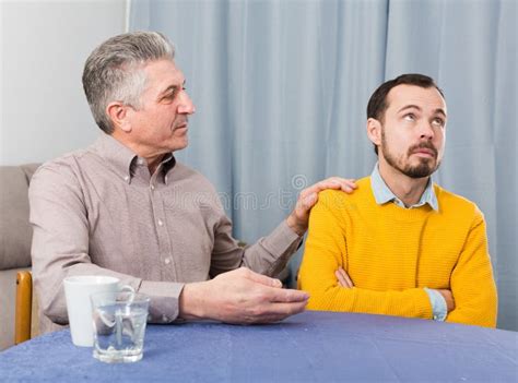 Mature Father And Son Serious Talk Stock Image Image Of Insult
