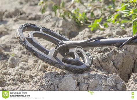 The Metal Detector Lies On The Earth In A Sunny Day Stock Image Image