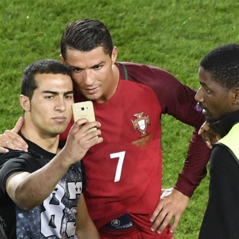 Euro Cristiano Ronaldo Holds Off Security So Pitch Invading Fan