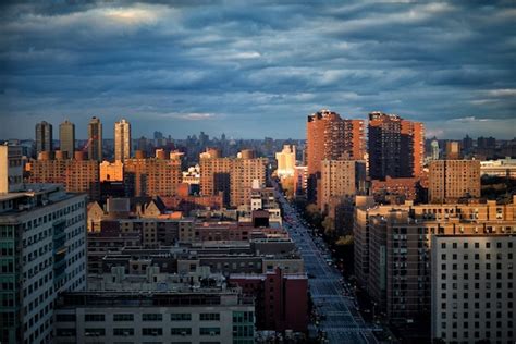 Premium Photo Cityscape Against Cloudy Sky