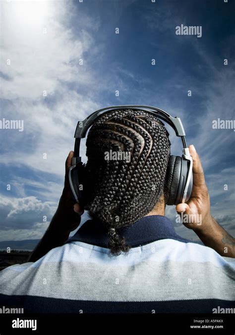 African American Man Listening To Music On Headphones Stock Photo Alamy