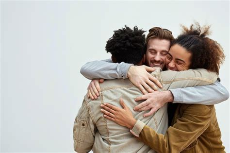 Premium Photo A Group Of Friends Hugging Each Other In A Hug