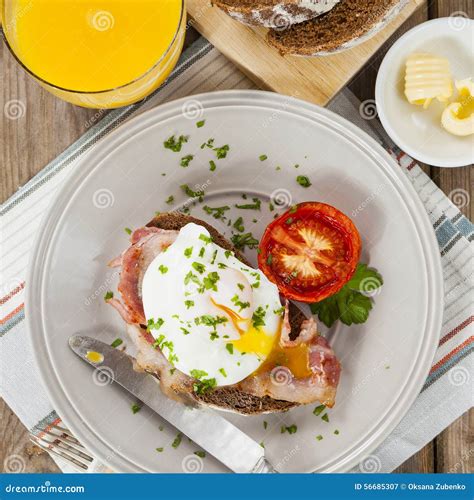 Poached Egg And Bacon On Rye Bread Healthy Breakfast Stock Image