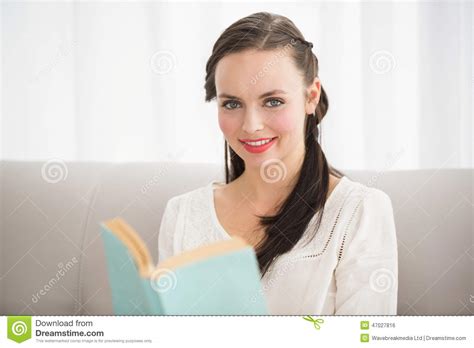 Pretty Brunette Reading Book On Couch Stock Photo Image Of Brunette
