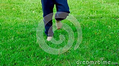 Barefoot Preschool Boy Running Forward on Grass, Slow Motion Stock ...