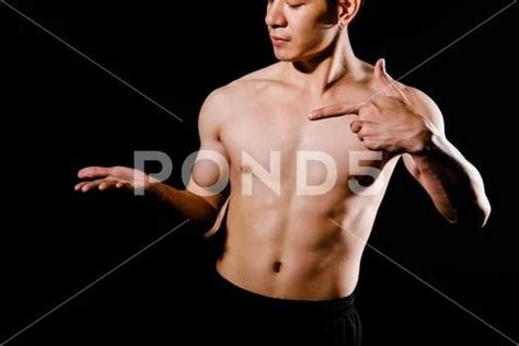Athletic Muscular Bodybuilder Man With Naked Torso Six Pack Abs Showing