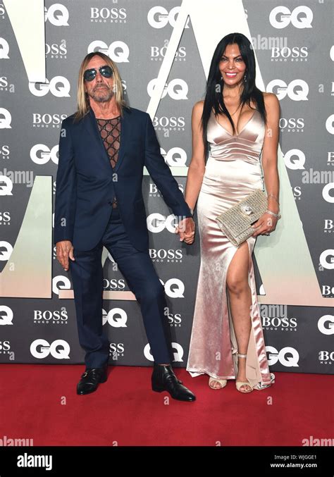 Iggy Pop Left And Wife Nina Alu Arriving At The Gq Men Of The Year