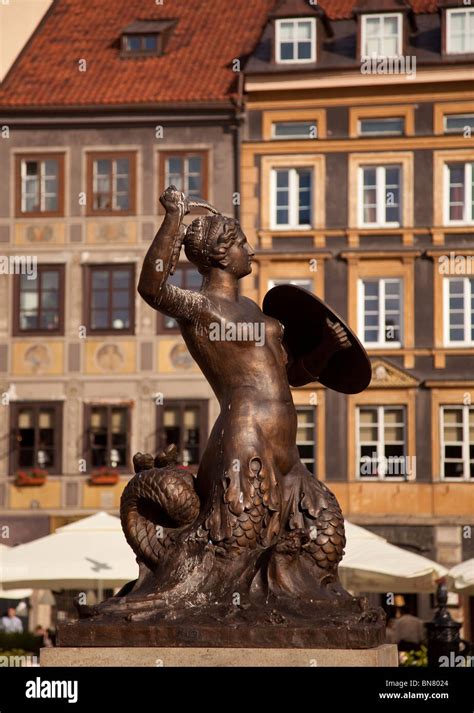 Statue Of Mermaid Or Syrena In The Old Town Square Of Warsaw In Poland