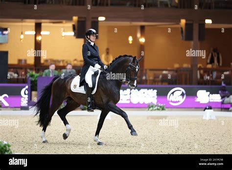 Alisa Glinka of Moldova with Abercrombie during the Dressage Grand Prix ...