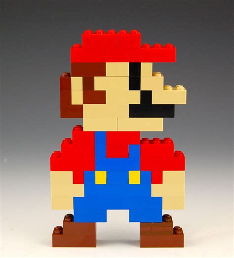 A Lego Mario Is Standing On One Leg