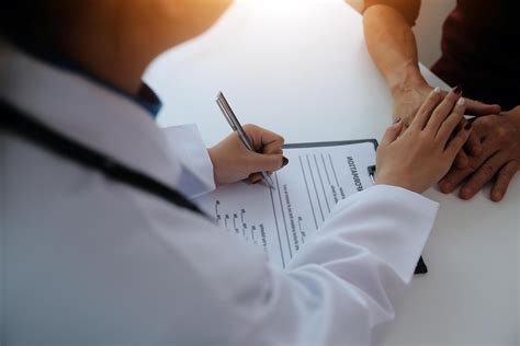Female doctors shake hands with patients encouraging each other To