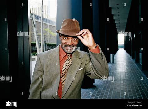 Black Businessman Tipping His Hat Stock Photo Alamy