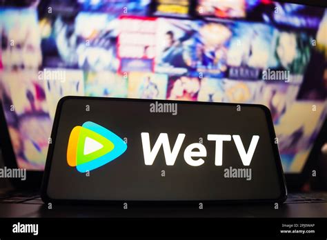 In this photo illustration, the WeTV logo is displayed on a smartphone screen Stock Photo - Alamy