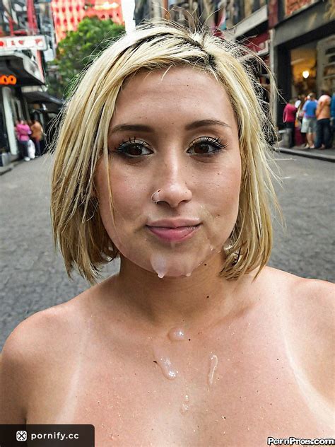 Blonde Chubby Playful Caucasian Girl With Freckles In Cityscape