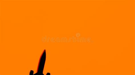 Jet Airplane Airliner Silhouette Is Flying In Orange Sunset Sky Slow