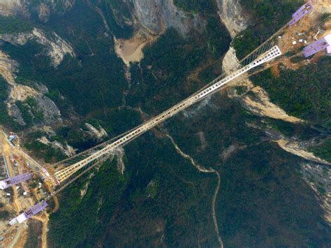 In Photos Would You Walk On This Glass Suspension Bridge Globalnewsca