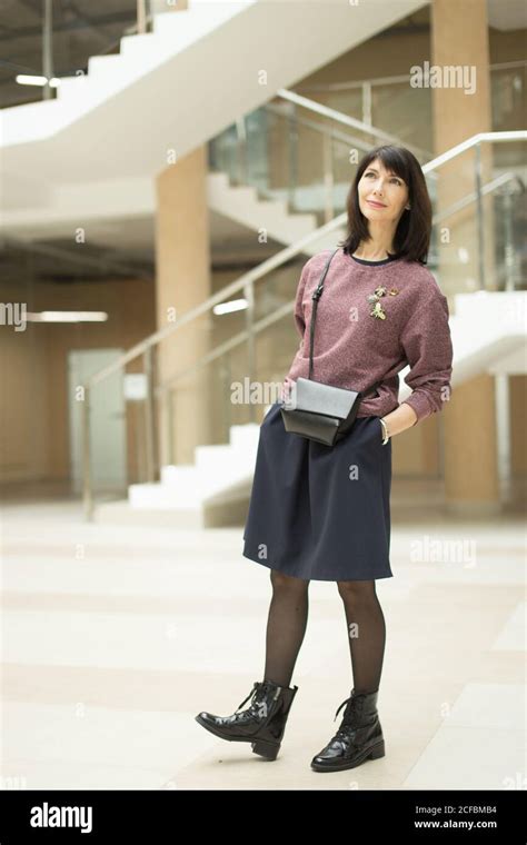 Portrait Of A Beautiful Casual Closes Mature Woman Walking Indoor Stock Photo Alamy