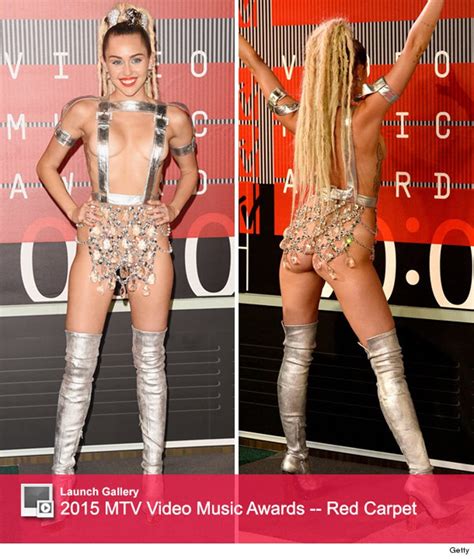 X See All Of The Ridiculously Revealing Outfits Miley Cyrus Wore At