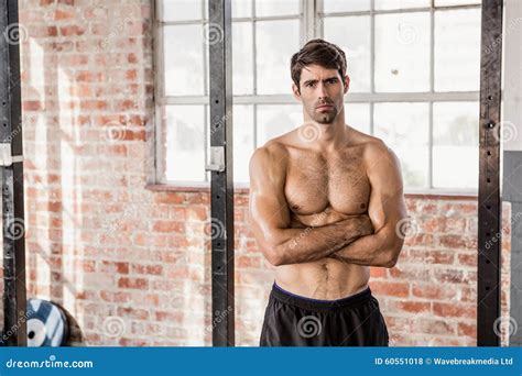 Portrait Of A Shirtless Man With Arms Crossed Stock Photo Image Of